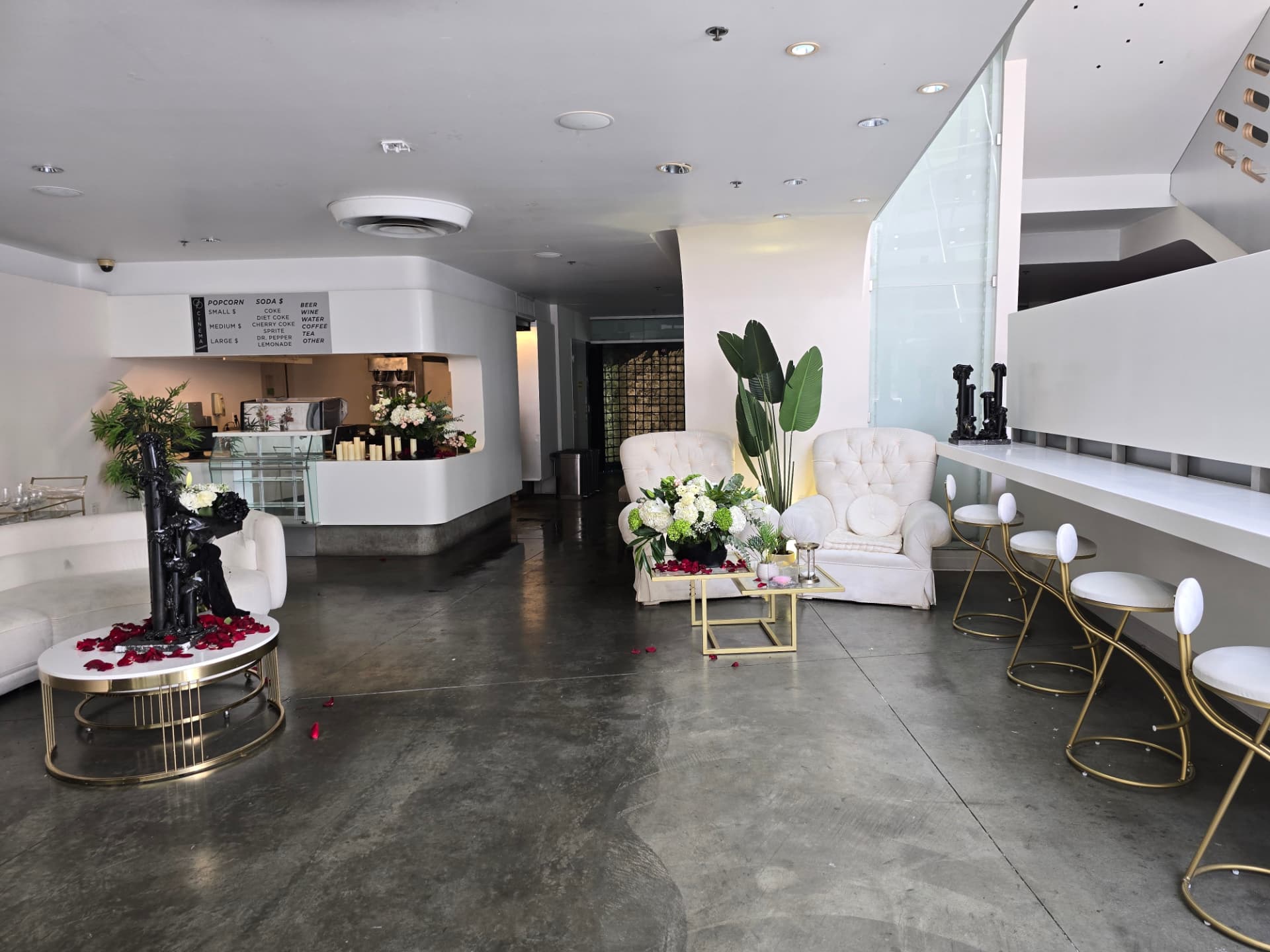 A wedding ceremony set in the glass atrium lobby